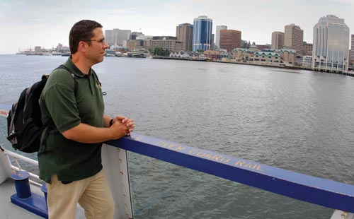 Gary Smith on the Ferry with Halifax skyline in BG.JPG