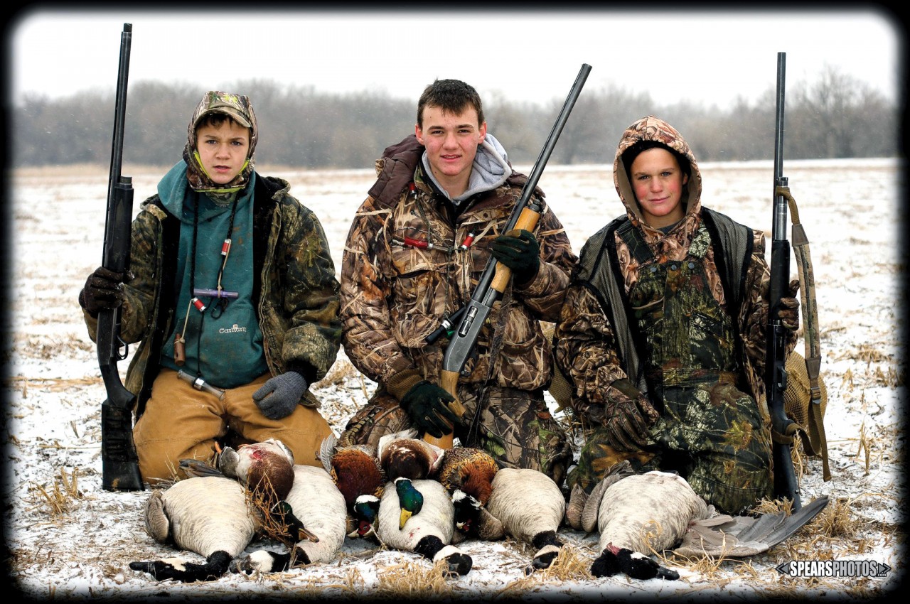 From left, Dakota Craig, Nick Spears and Dallas Craig share the results of their hunt. The young men participate in Team Blind Faith, a Christian discipleship program that is incorporated while they are hunting. 