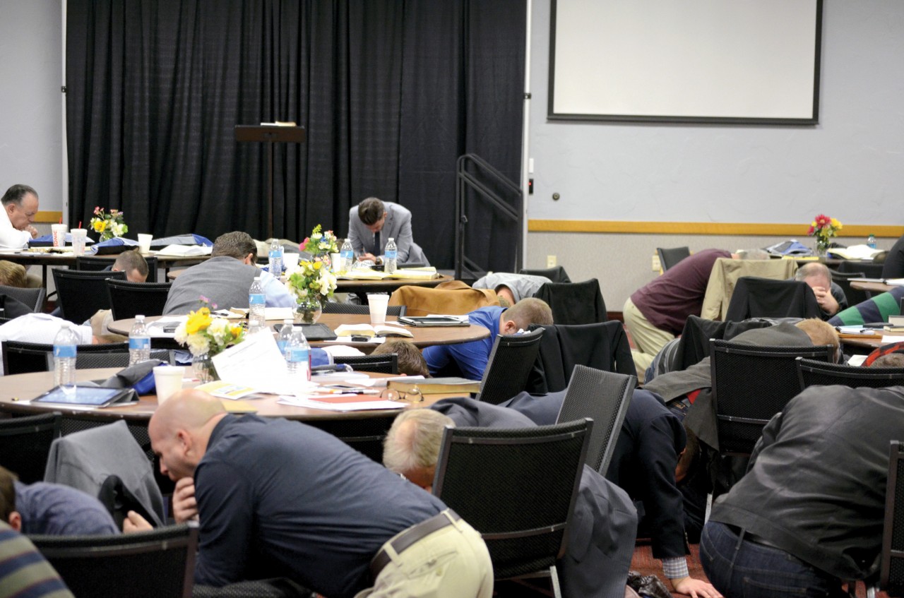 Priority of Preaching Conference attendees spent time on their knees, praying for revival.