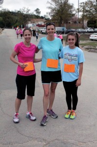 The top three finishers of the 2014 Women’s Retreat 5K are pictured, including a new retreat record set by 13-year-old Madalyn Harper, right, with a time of 23:18.