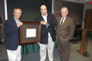 From left, Kevin Clarkson, pastor of Moore, First and Kyle Duncan, Business Administrator of Moore, First, receive a certificate of appreciation from BGCO Executive Director-Treasurer Anthony L. Jordan and the BGCO board for the church’s donation of a 5-acre tract of land to be used as a storage/launch site for BGCO Disaster Relief.