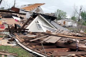 A house is left flattened by the tornado in Quapaw.