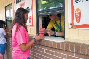 An ACC camper observes a Falls Creek tradition, as she receives one of the first Icees of the summer.