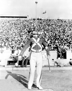 While attending the University of Oklahoma in the 1940s, Ed Walker was a drum major who excelled in balancing a baton on his chin while twirling two others. 