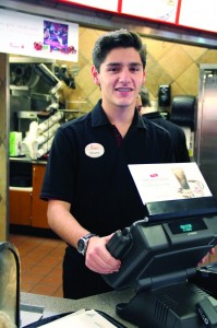 Shane behind counter
