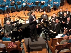 Pastor Blake Gideon, center, gave an invitation at the concert. A woman called him the next day, and the Edmond, First pastor led her to Christ. (Photo: Stuart Holland)