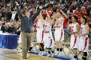Coach Justin Janz celebrates a victory at the State High School Tournament (Photo: Lori May)