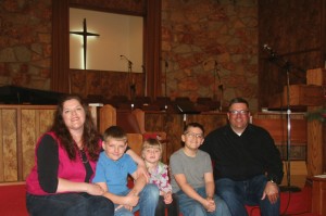 Chad and Anna are pictured with their three children, Sean, Ruby and David.