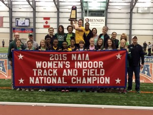 The OBU women’s track team display their 2015 NAIA Indoor Track & Field National Championship Banner