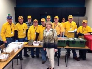 Oklahoma Governor Mary Fallin poses with Disaster Relief volunteers who served lunch at the oil workers job fair