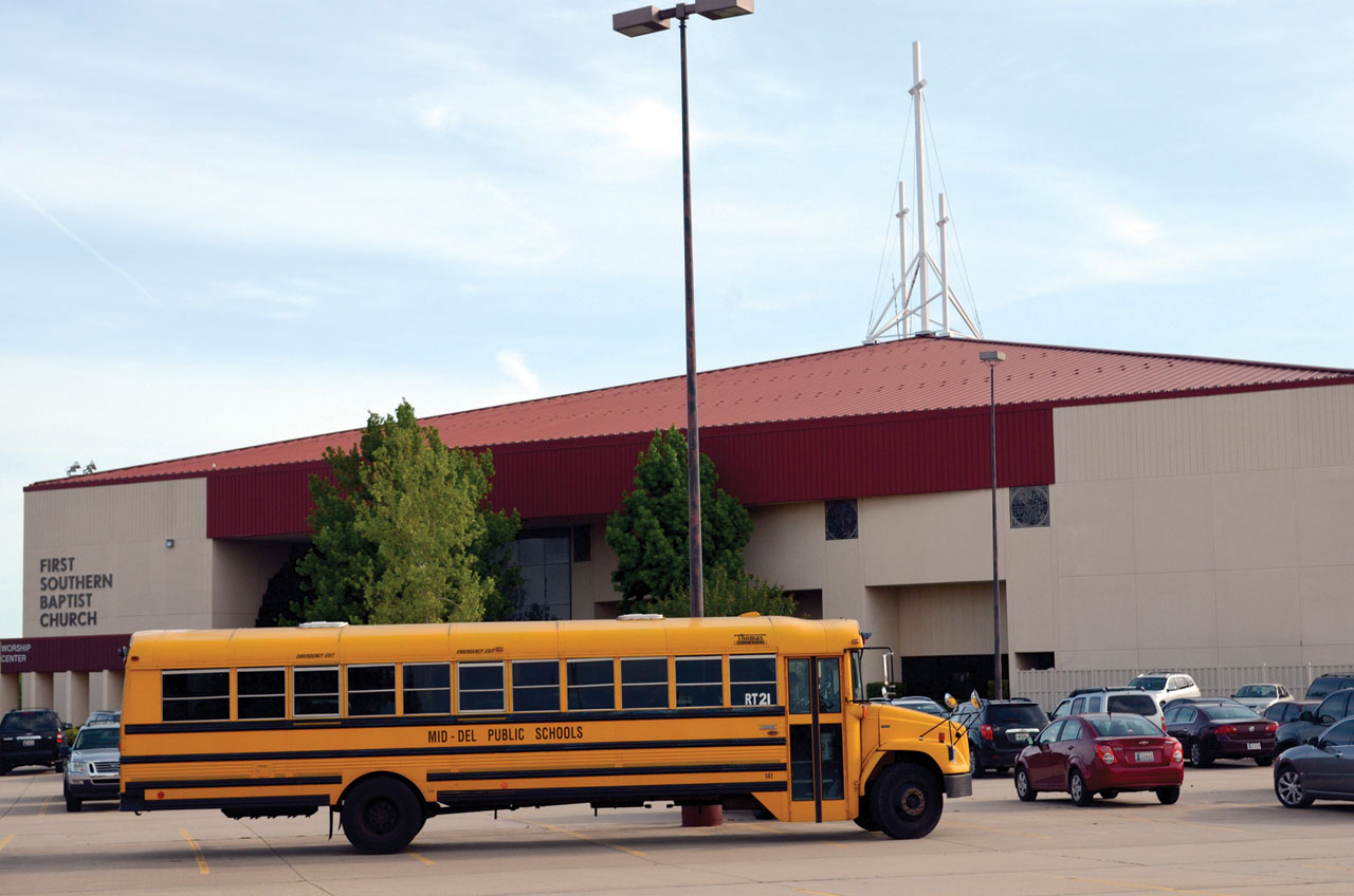 A school bus delivers Tinker Elementary School students to Del City, First Southern (Photo: Bob Nigh)