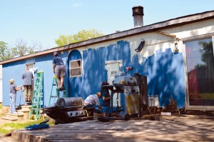 Mission in Medford volunteers paint a home as part of ReVitalize Weekend, May 1-2. (Photo: Bob Nigh)