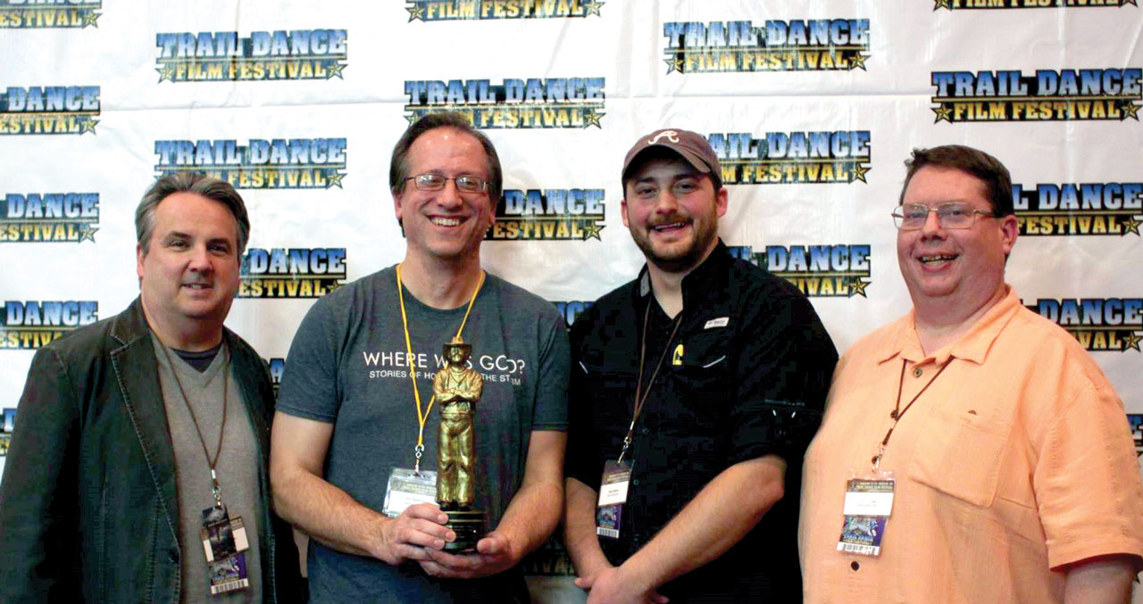 “Where Was God?” production team, from left, of Chris Forbes, Don Stephens, Travis Palmer and Ricky Pope present their award from Trail Dance Film Festival. (Photo: Critical Mass Productions, LLC)