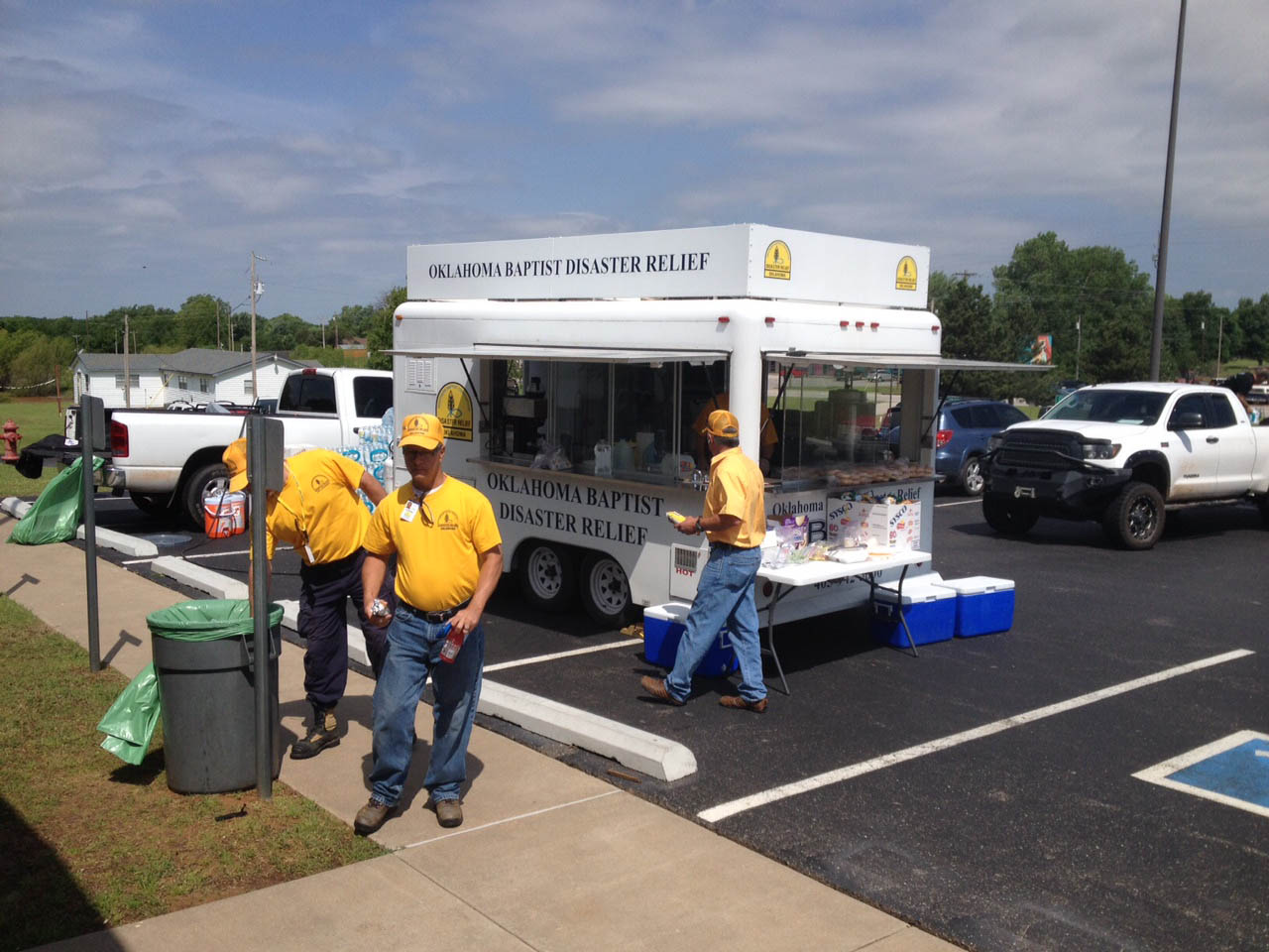 Oklahoma Baptist disaster relief volunteers serve meals on Thursday to victims and volunteer workers, at Snow Hill Baptist Church near Tuttle. (Photo: Brad Biddy)