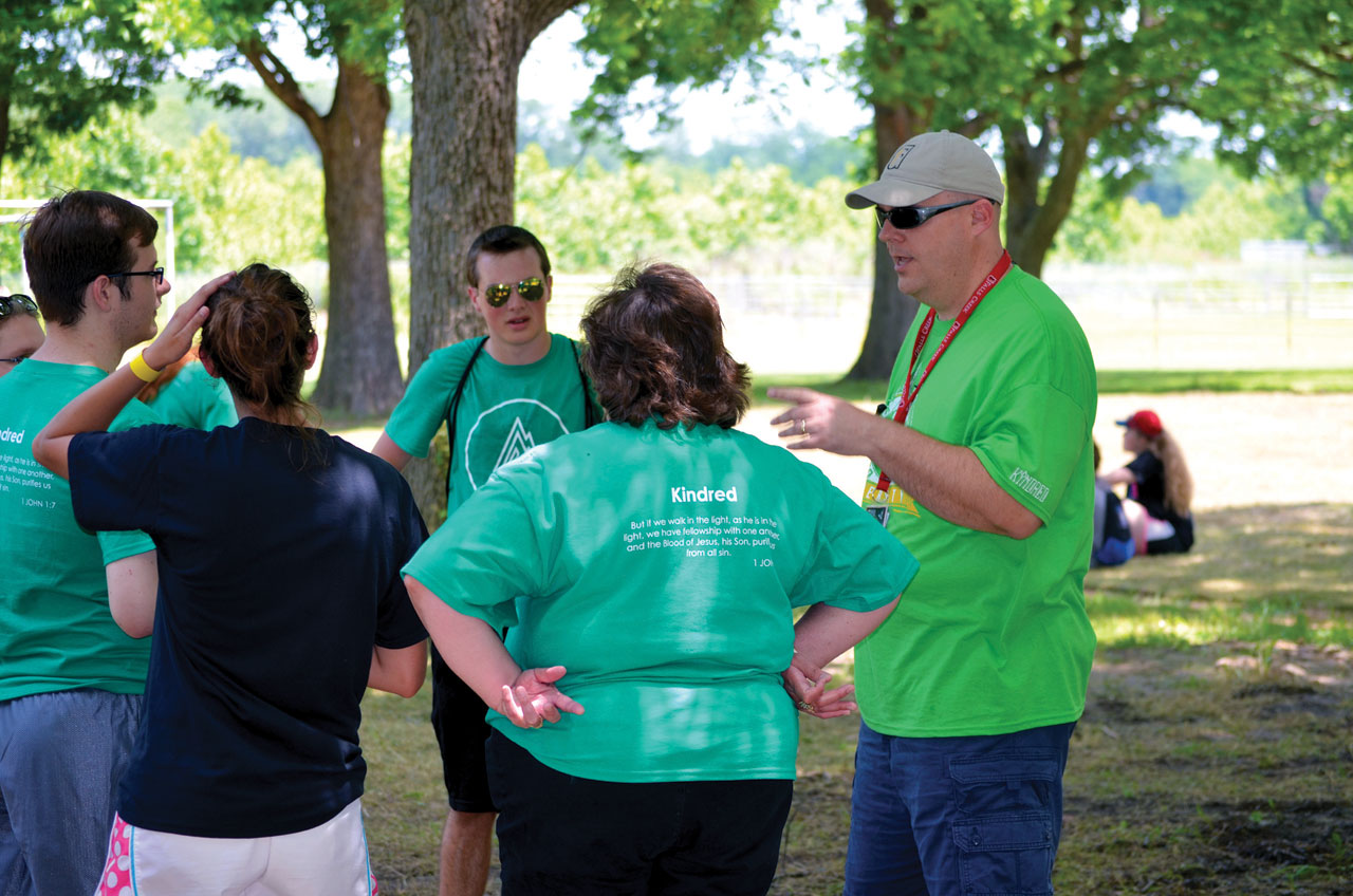 5) Jacon Langley, new BGCO director of conference centers, right, interacts with campers and sponsors at the Riverfront Recreation Area (Photo: Chris Doyle)