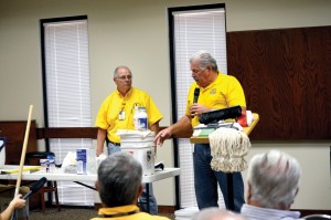 Brown and Sam Porter, Baptist General Convention of Oklahoma disaster relief director, demonstrate items that can be used to clean out and sanitize a home or business that has been contaminated by floodwaters. Other such classes were held in Bixby, Durant, Elk City, Lawton and Poteau. (Photo: Bob Nigh)