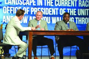 Hance Dilbeck, second from left, answers a question posed by Ronnie Floyd, left, on the panel discussing “Pastors and The Church in American Politics Today.” A.B. Vines, pastor of Spring Valley, Calif., New Seasons, right, listens (Photo: Brian Hobbs)