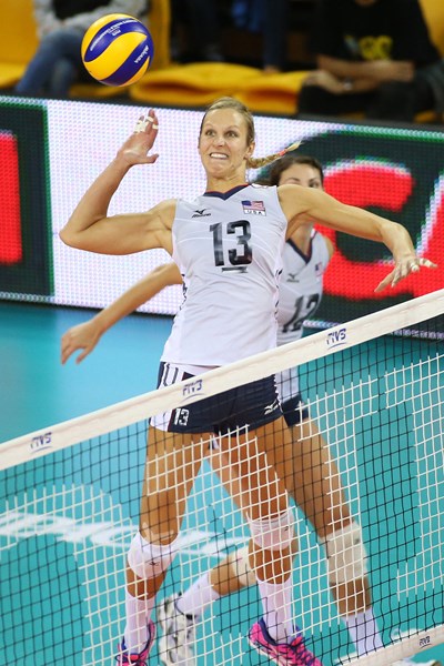 U.S. team captain Christa Harmotto Dietzen spikes volleyball during game with Turkey. Photo courtesy of FIVB 