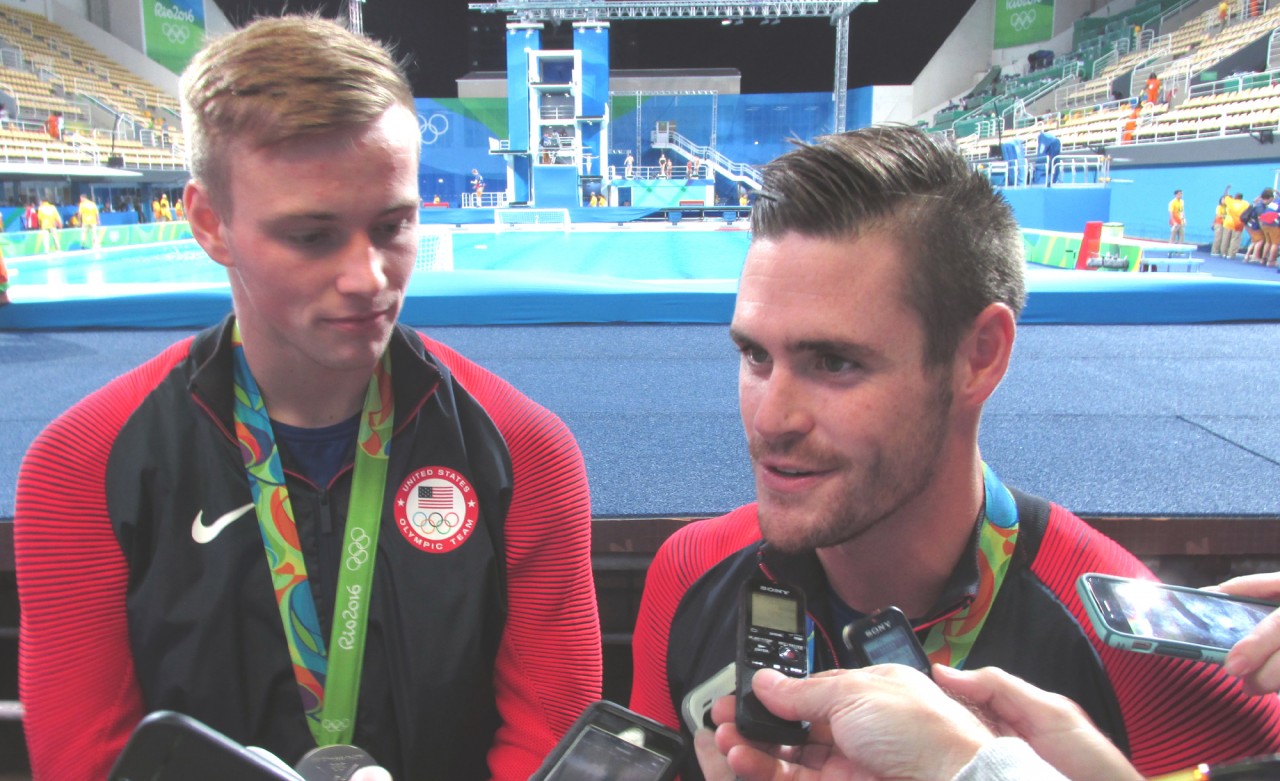 Steele Johnson (left) and David Boudia talk to the media after winning a silver medal in the men's synchronized 10-meter platform event. Photo by Tim Ellsworth 