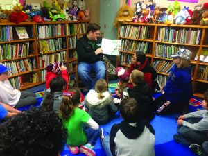 Zach Clark has participated in elementary school reading programs
