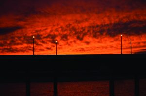 The sky is ablaze above a Western St. bridge in Oklahoma City.