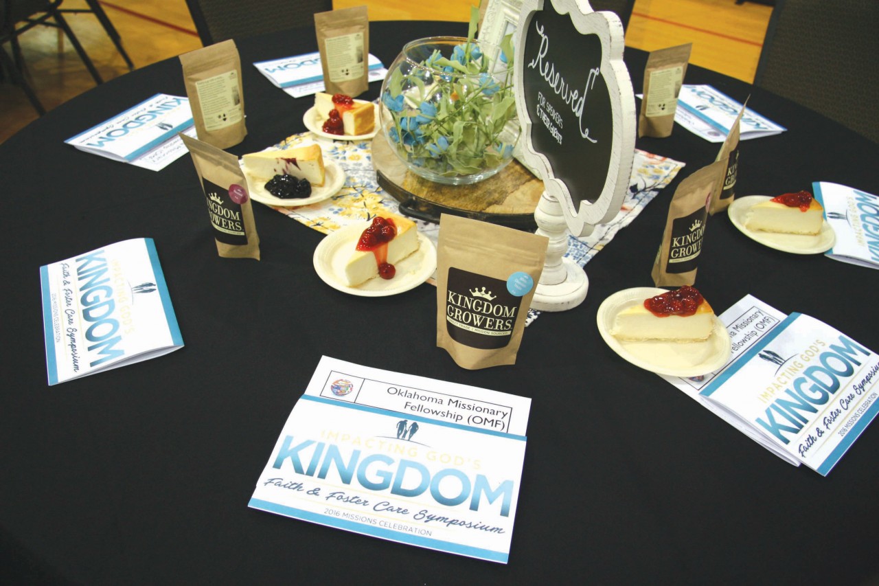 Table settings at Oklahoma Missionary Fellowship included a free bag of Kingdom Growers coffee.