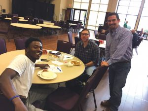 Brett Vawter, right, led the churchwide card-signing project, which originated as a project for his Sunday School class.