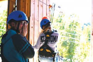 Students enjoying zipline