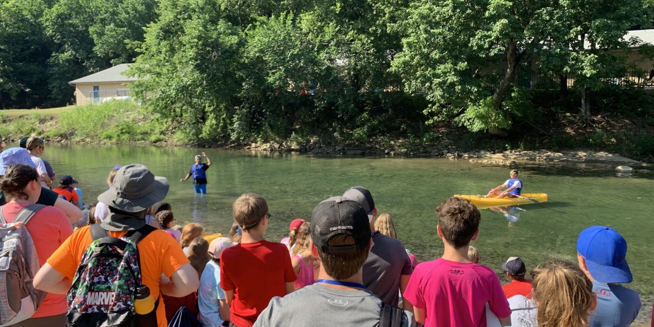 Cordova preaches from the creek at CrossTimbers