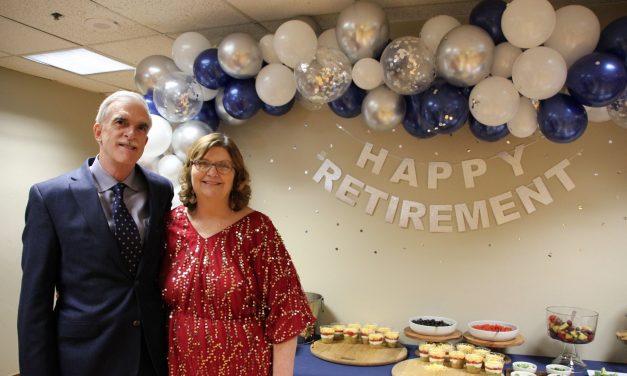 Russell recognized at retirement reception