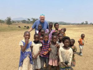 Ada, Okla., pastor Brad Graves with a group of children in Malawi while on a mission trip. (Photo provided)
